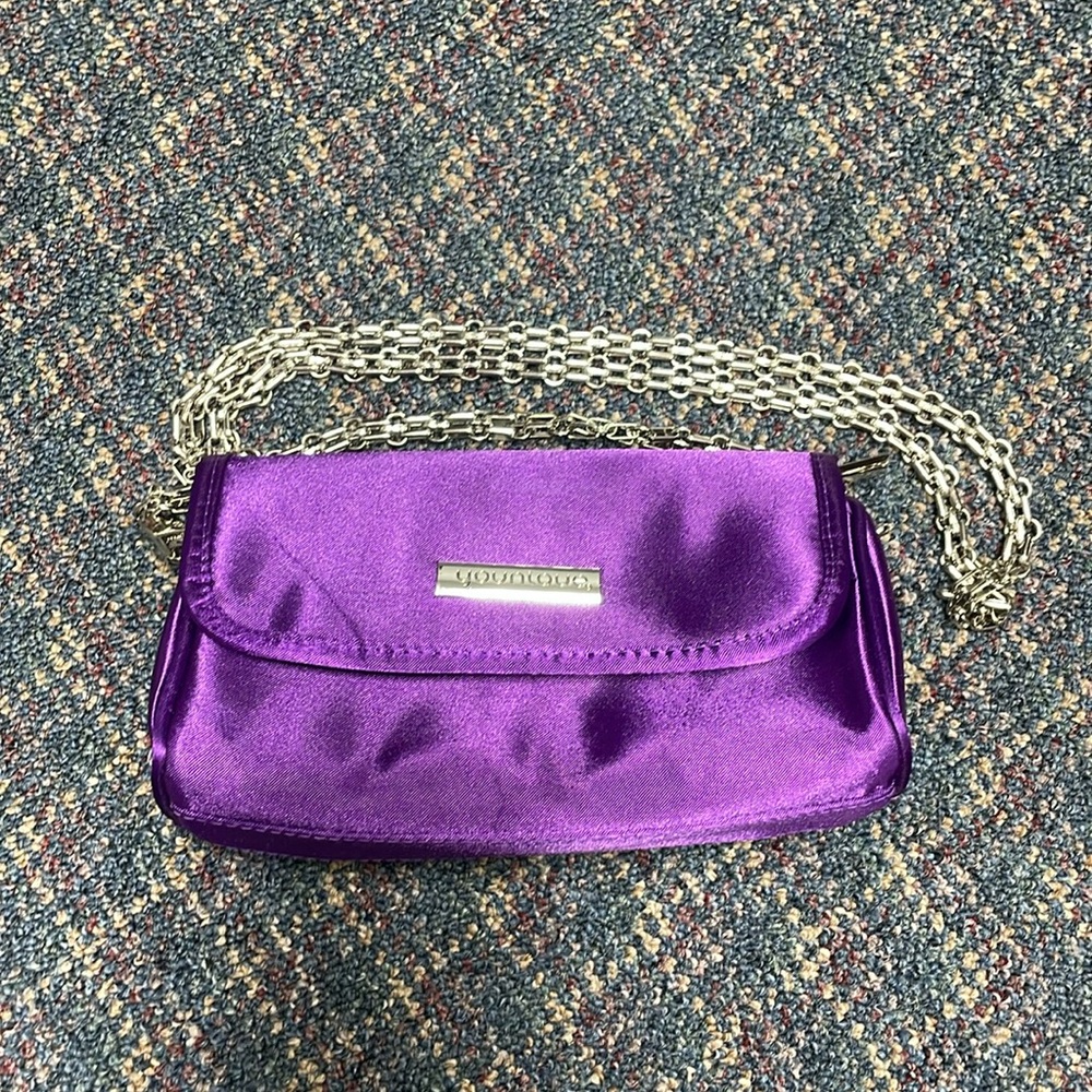 Like new Younique clutch style bag with optional shoulder strap purple